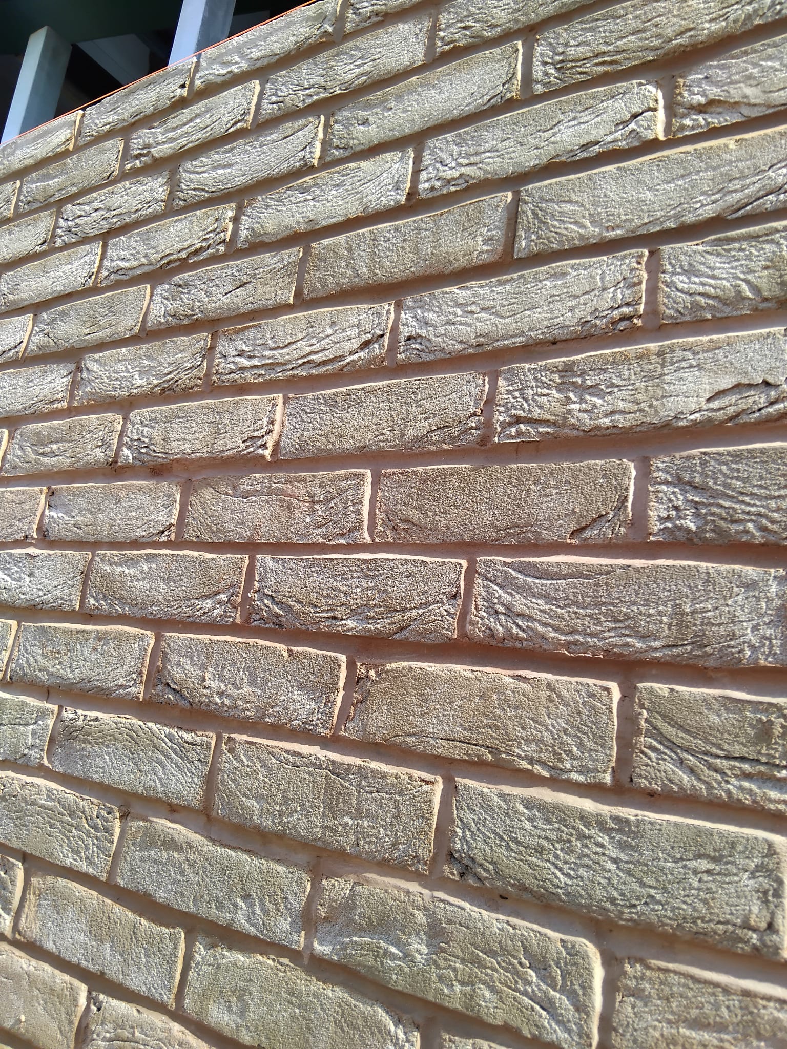 Buff brick wall close-up